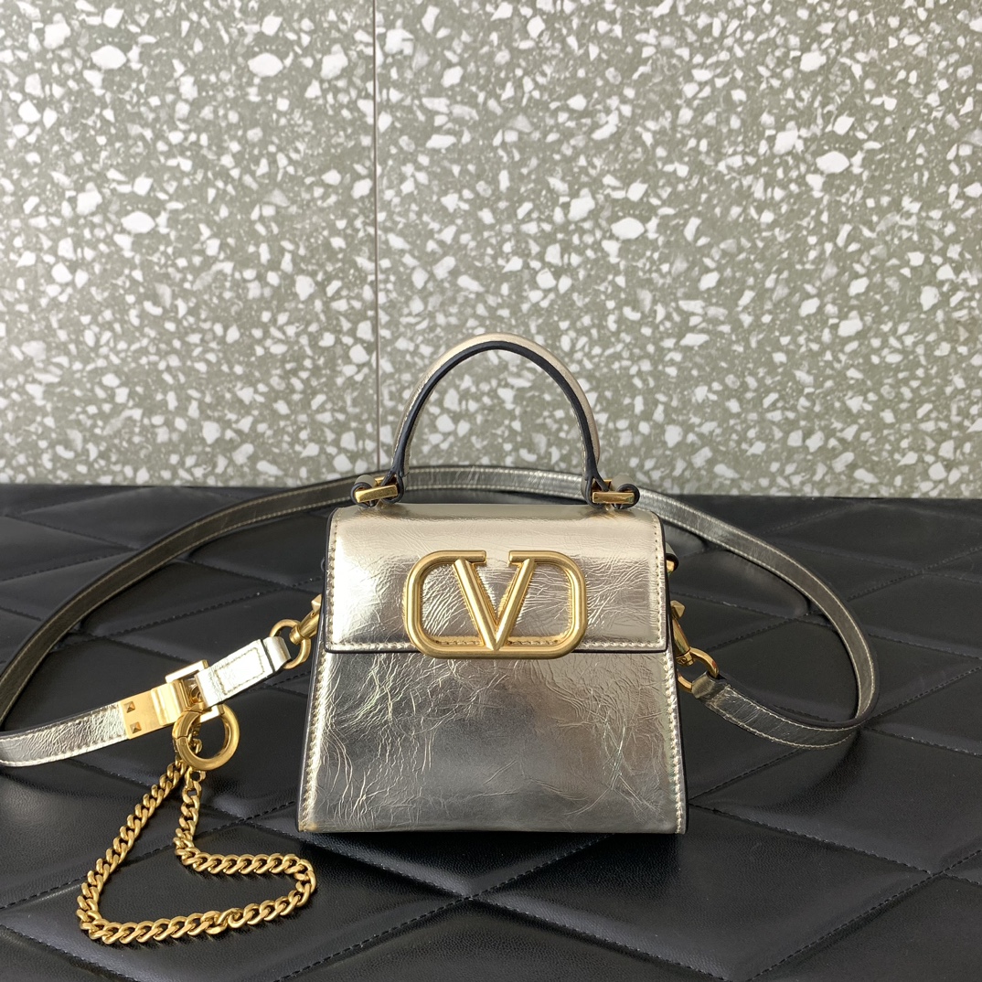 Valentino Garavani Vsling Micro Handbag in Gold Grainy Calfskin Leather